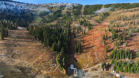 drone photo of schweitzer slopes with fall colors