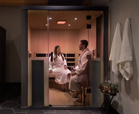 couple sitting in sauna at cambium spa