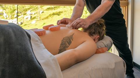Schweitzer guest receives stone treatment at Cambium Spa