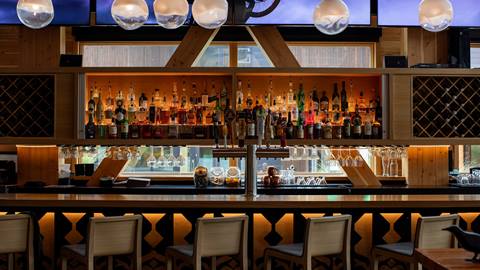 bar with liquor on shelf at Crow's Bench at Schweitzer