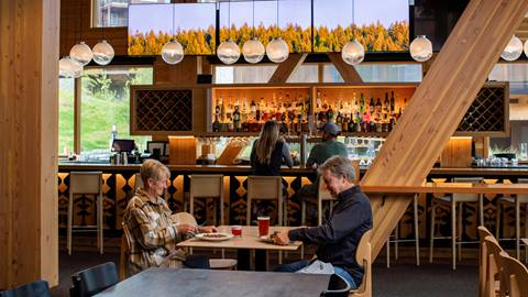 couple eating dinner at Crow's Bench at Schweitzer