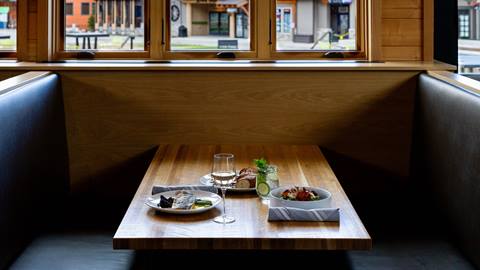 picture of dinner setting with dinner and wine at Crow's Bench at Schweitzer