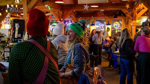 image of person sitting at the bar at taps at Schweitzer