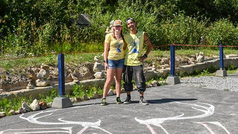 Two Schweitzer employees smiling at Fall Fest