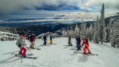 group of women stopped on the slopes at Schweitzer