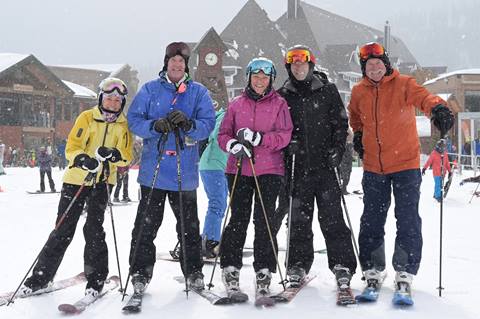 group of people on skis in the Village at Schweitzer
