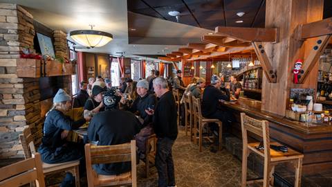 large group of people dining at Chimney Rock at Schweitzer
