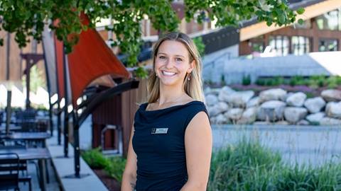 picture of woman in front of trees and walkway at schweitzer