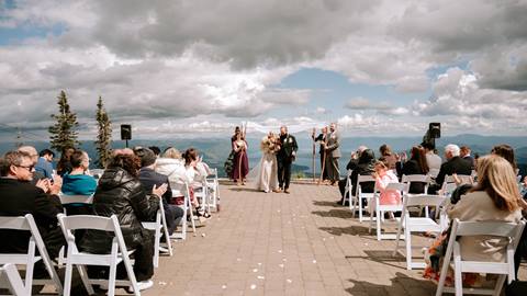 image of couple getting married at the summit of schweitzer