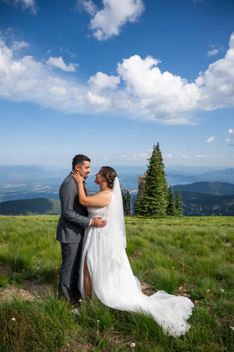 bride and groom at summit of schweitzer for their wedding day