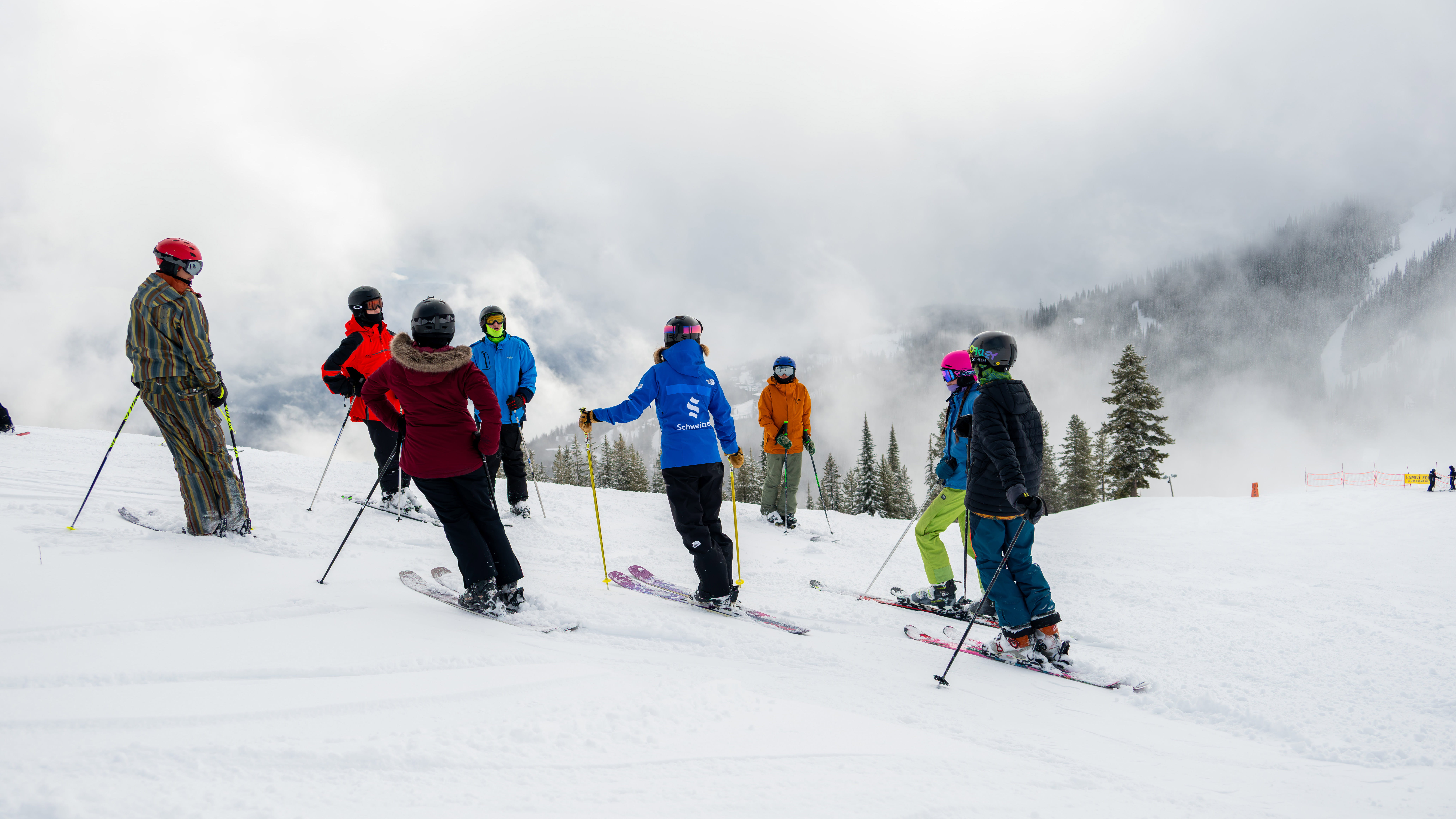 ski instructor with group of ski students