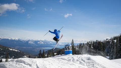 ski instructor hitting park feature at Schweitzer
