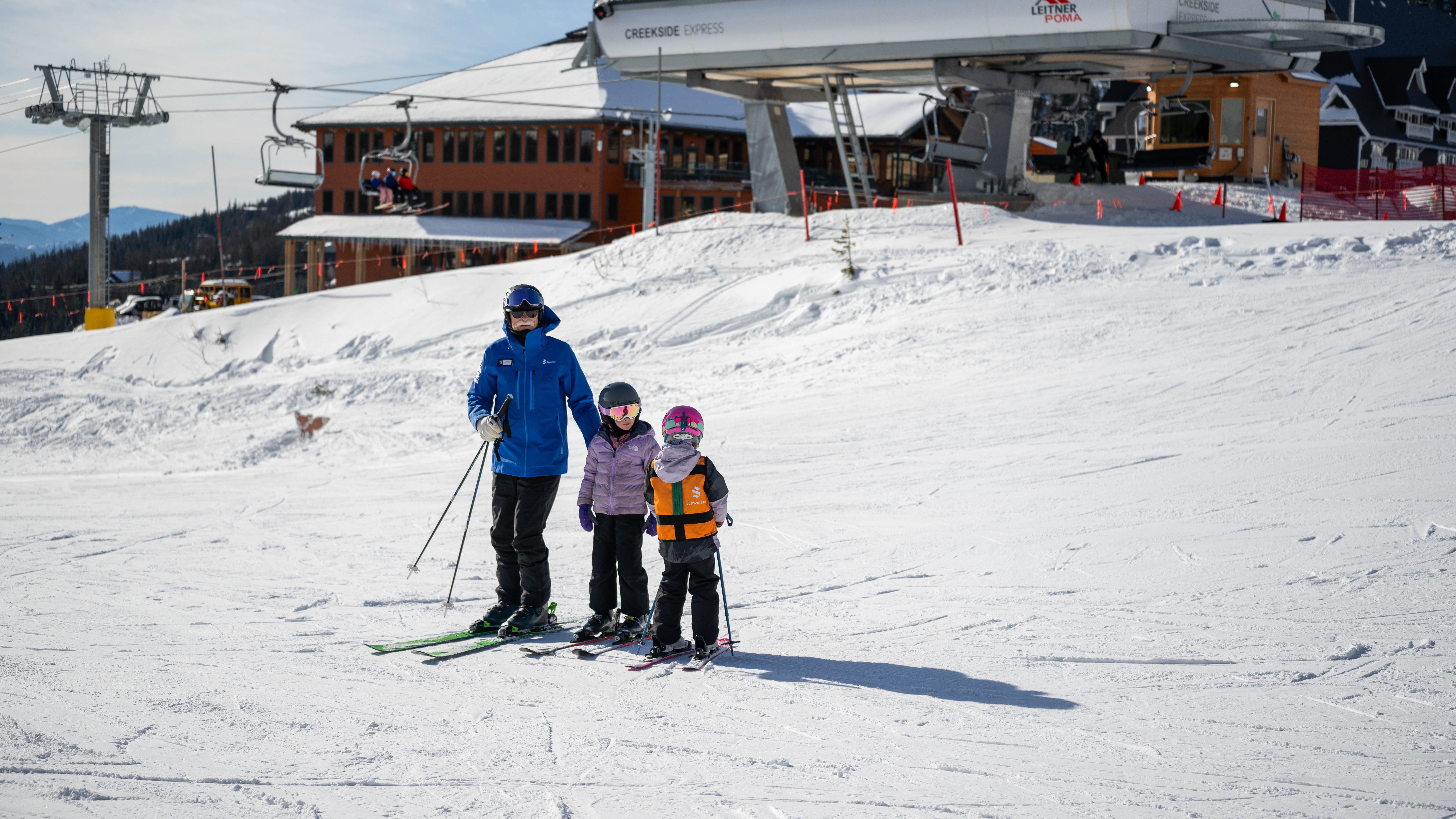ski instructor with small skiers at Schweitzer