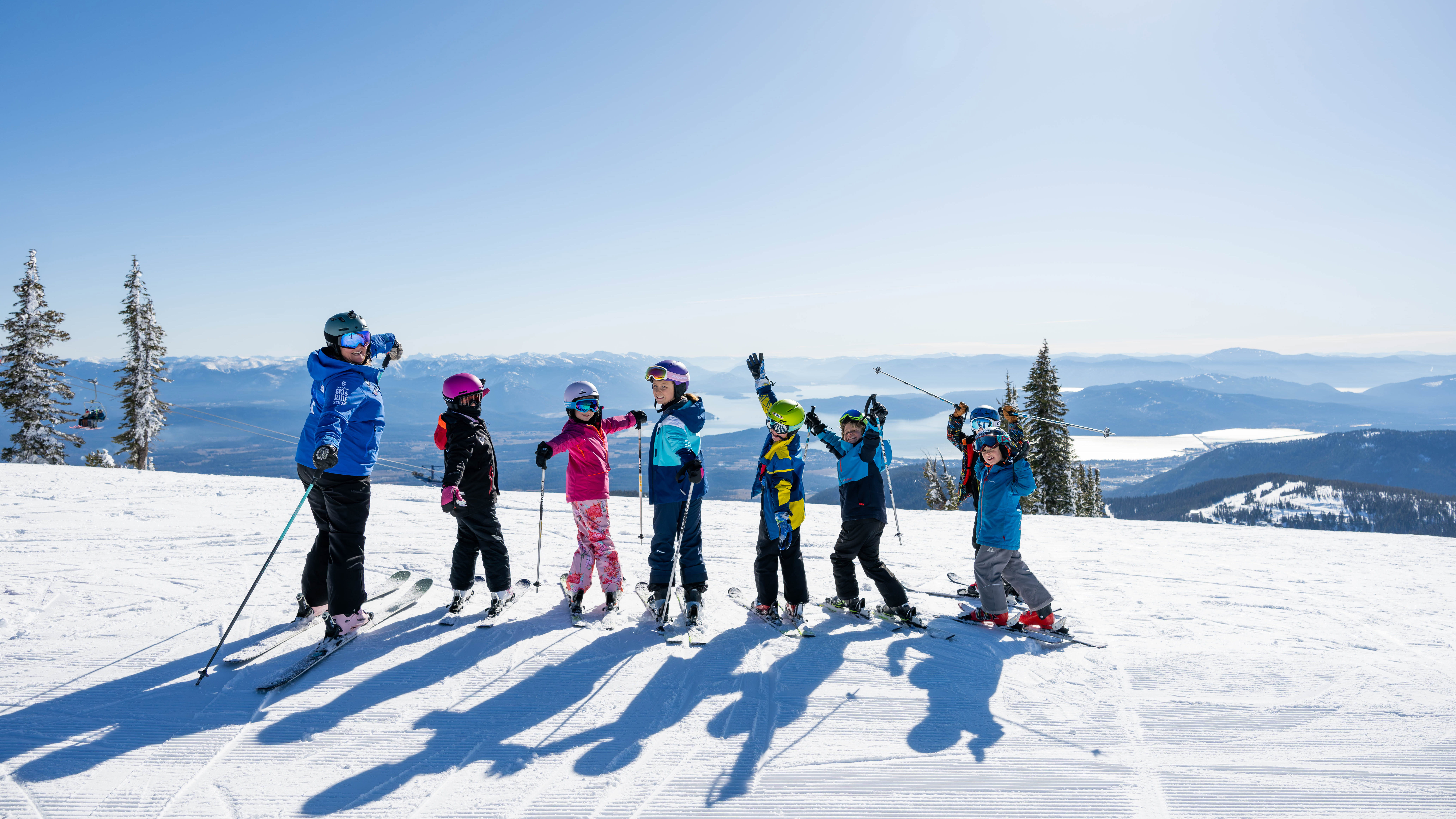 smiling group of kids in ski lesson
