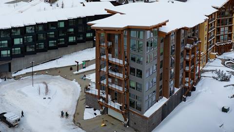 exterior of 5 needles hotels & vacation rentals at schweitzer