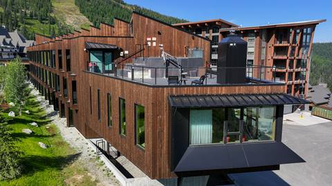 Schweitzer lodging Humbird exterior in summer