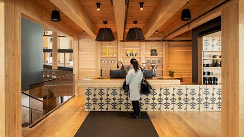 image of person at front desk at Humbird at Schweitzer