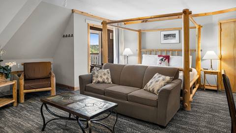 image of couch, bed, and coffee table at Selkirk Condo at Schweitzer