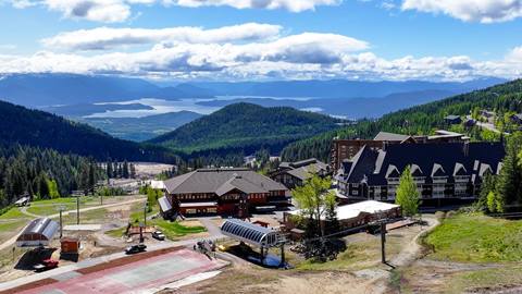 Schweitzer Village in the summer with a view of Lake Pend Oreille