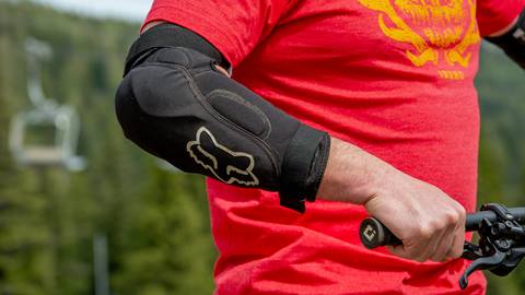 mountain bike elbow pads secured on a rider arm at schweitzer