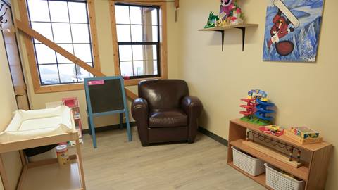 the quiet reading and infant care nursery space located inside the schweitzer childcare building