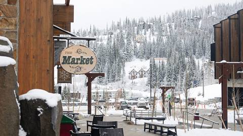 Exterior image of the Market hanging sign.