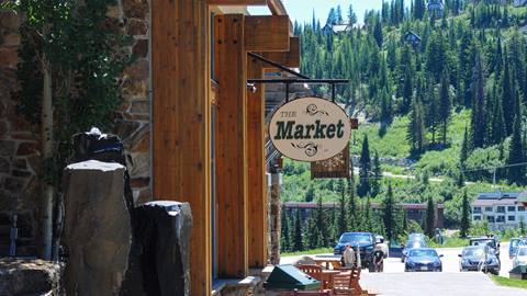 the sign for the market at schweitzer