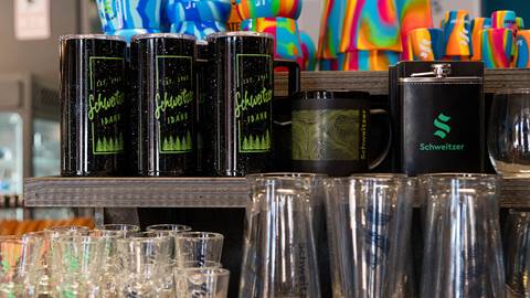 cups and flasks with Schweitzer logo