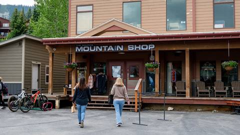 women walking into the source shop at Schweitzer
