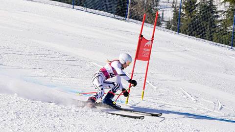 skier racing on race course at Schweitzer