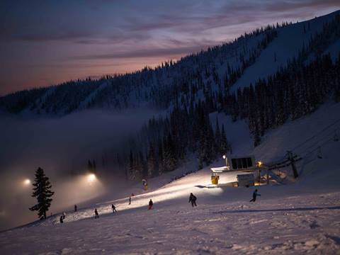 View of the chairlift with night lights on