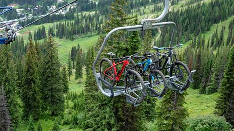 mountain bikes on chairlift at Schweitzer