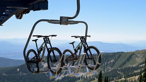 mountain bikes on chairlift at Schweitzer