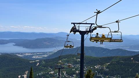 guests use summer lift tickets on a scenic chairlift ride with lake views at schweitzer 
