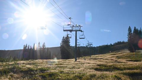 Summer chairlift with sunshine at Schweitzer