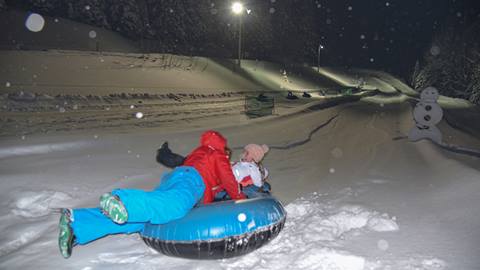 twilight snow tubing for families at schweitzer mountain resort