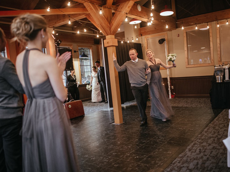 bridesmaid and groomsman in Caribou room